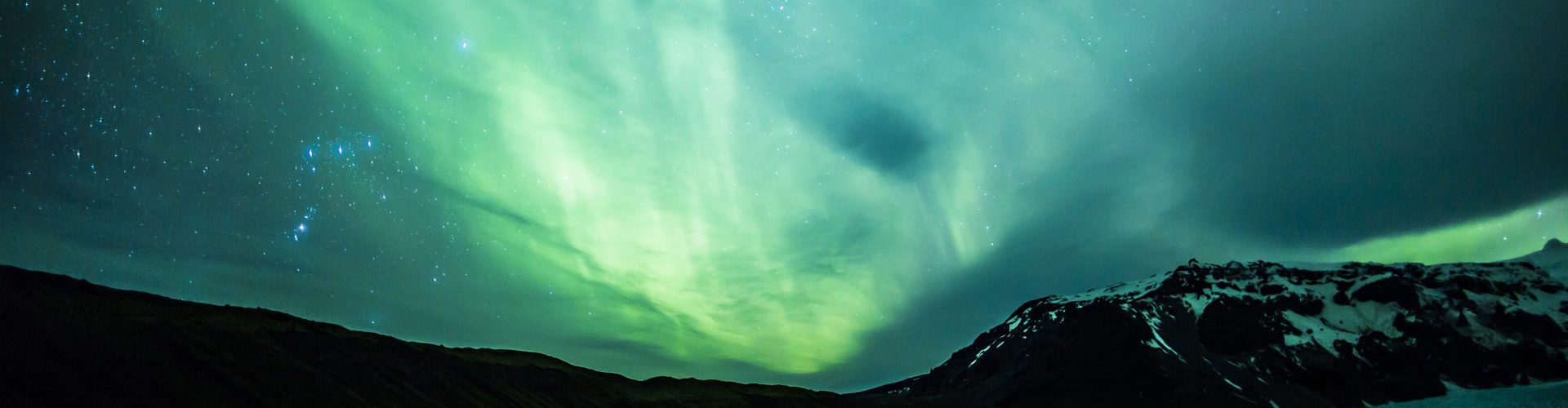 Aurora Borealis over a glacier lagoon in Iceland
